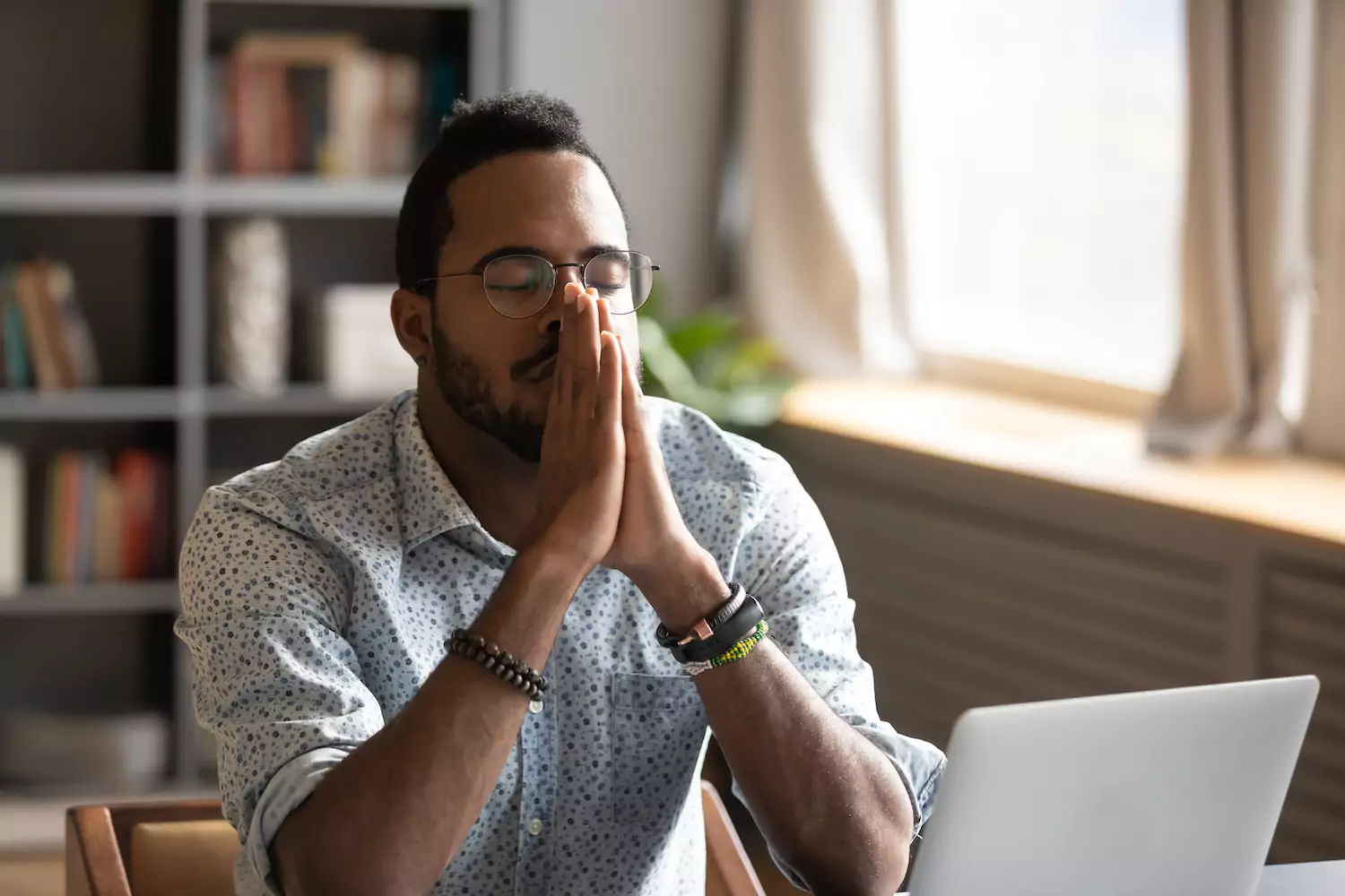 Black man praying